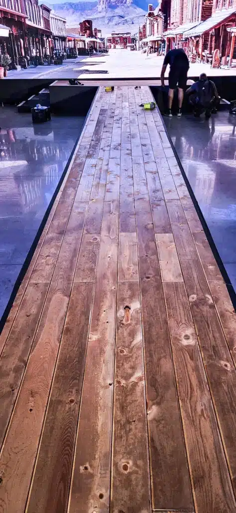 APAV Production crew prepares a runway for an event.