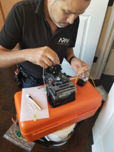 Technician evaluates audio equipment