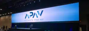 APAV Logo on a widescreen